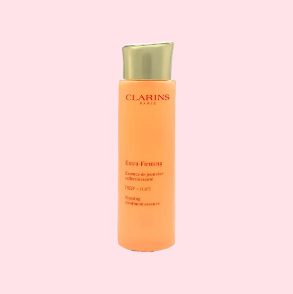 CLARINS EXTRA-FIRMING TREATMENT ESSENCE - The Body Essential